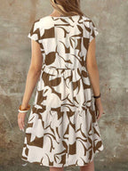 Vestido Midi Soltinho Com Recortes Estampa Abstrata Casual