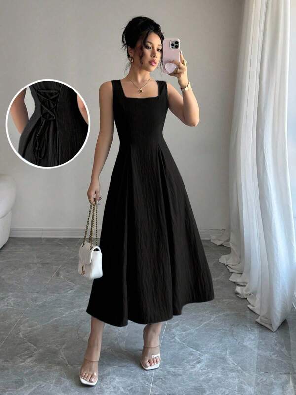 Vestido Longo Evasê Com Amarração Nas Costas Elegante