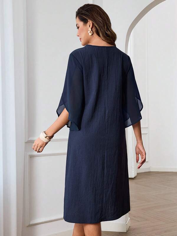 Vestido Midi Decote V Com Manga Fluida E Caimento Solto
