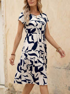 Vestido Midi Soltinho Com Recortes Estampa Abstrata Casual