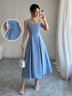 Vestido Longo Evasê Com Amarração Nas Costas Elegante