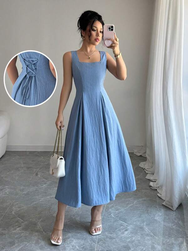 Vestido Longo Evasê Com Amarração Nas Costas Elegante